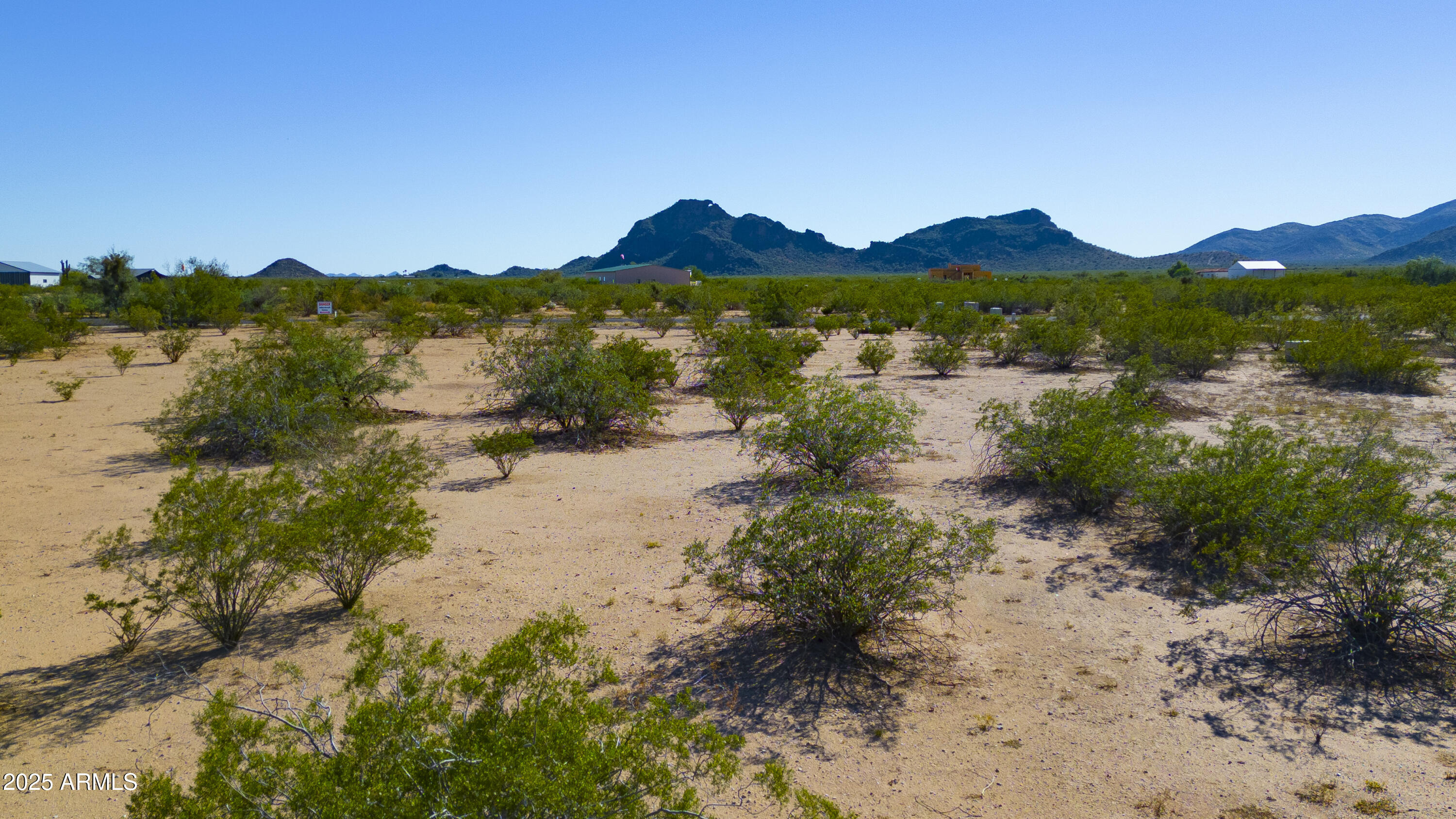50979 West Iver Road Aguila, AZ 85320 - Photo 2 of 21 a view of lake with mountain