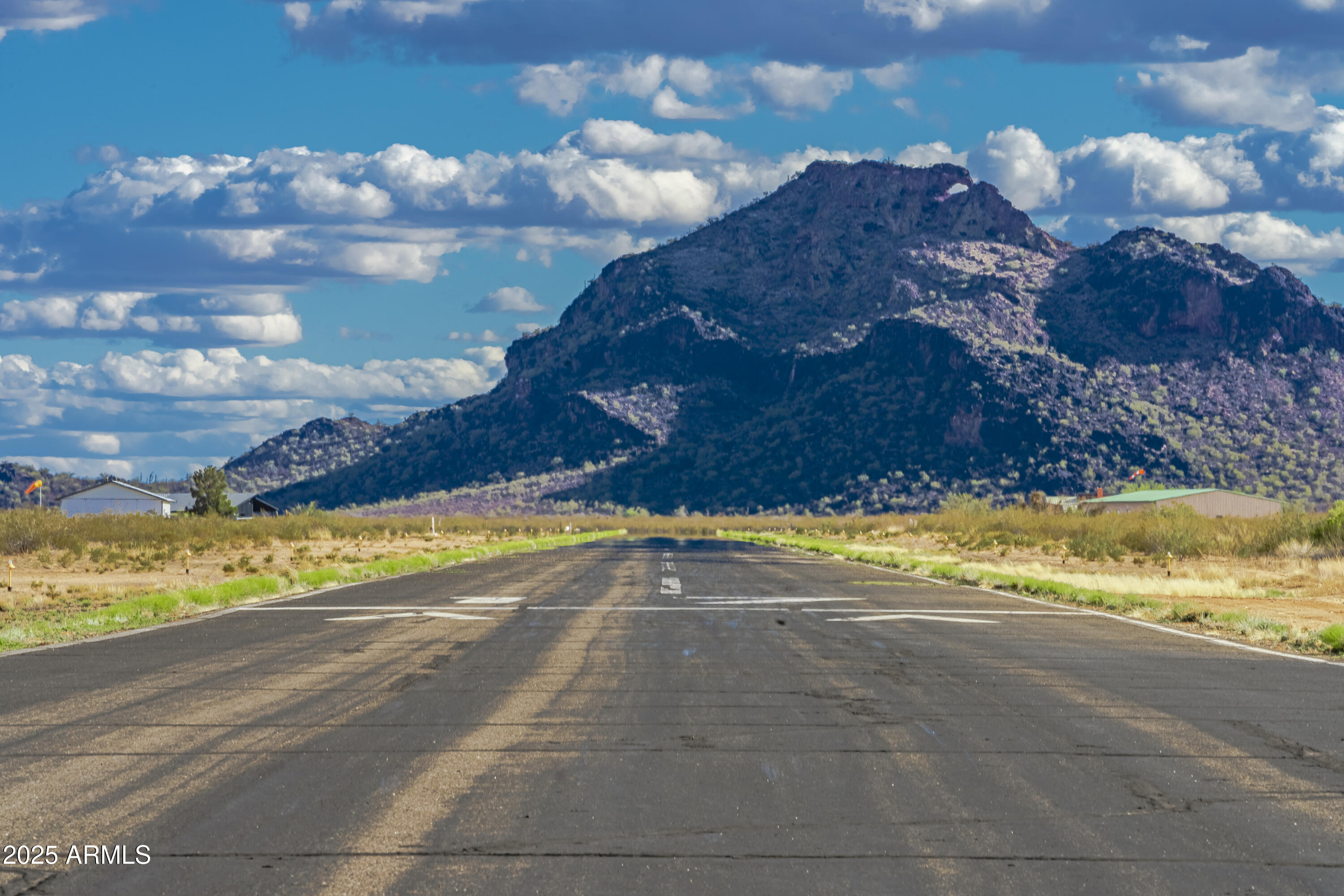 50979 West Iver Road Aguila, AZ 85320 - Photo 21 of 21 a view of a house with a yard