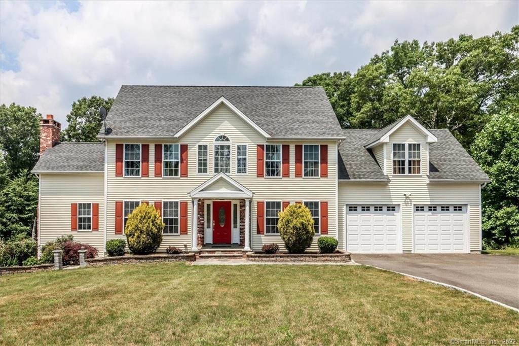 258 Osborn Road Naugatuck, CT 06770 - Photo 1 of 1 front view of a house with a yard
