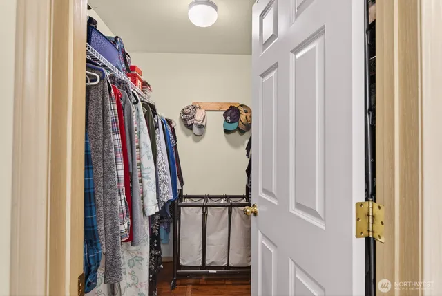 a view of a closet with storage