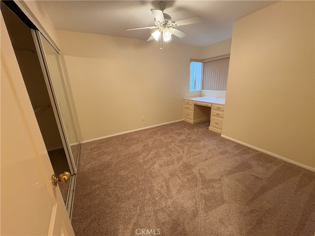 7149 Rockspring Lane Highland, CA 92346 - Photo 21 of 29 Bedroom # 2 with built in desk