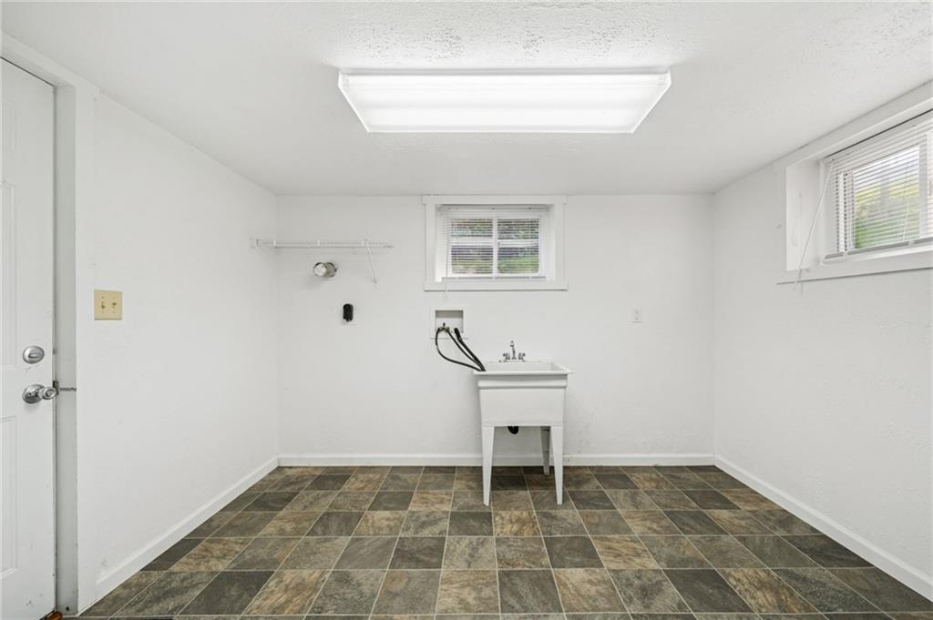 311 Lowell Street Vandergrift, PA 15690 - Photo 14 of 25 a view of an empty room with a window