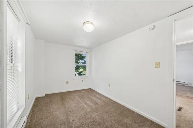 an empty room with window