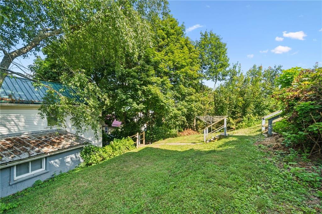 311 Lowell Street Vandergrift, PA 15690 - Photo 22 of 25 a view of outdoor space yard and swimming pool
