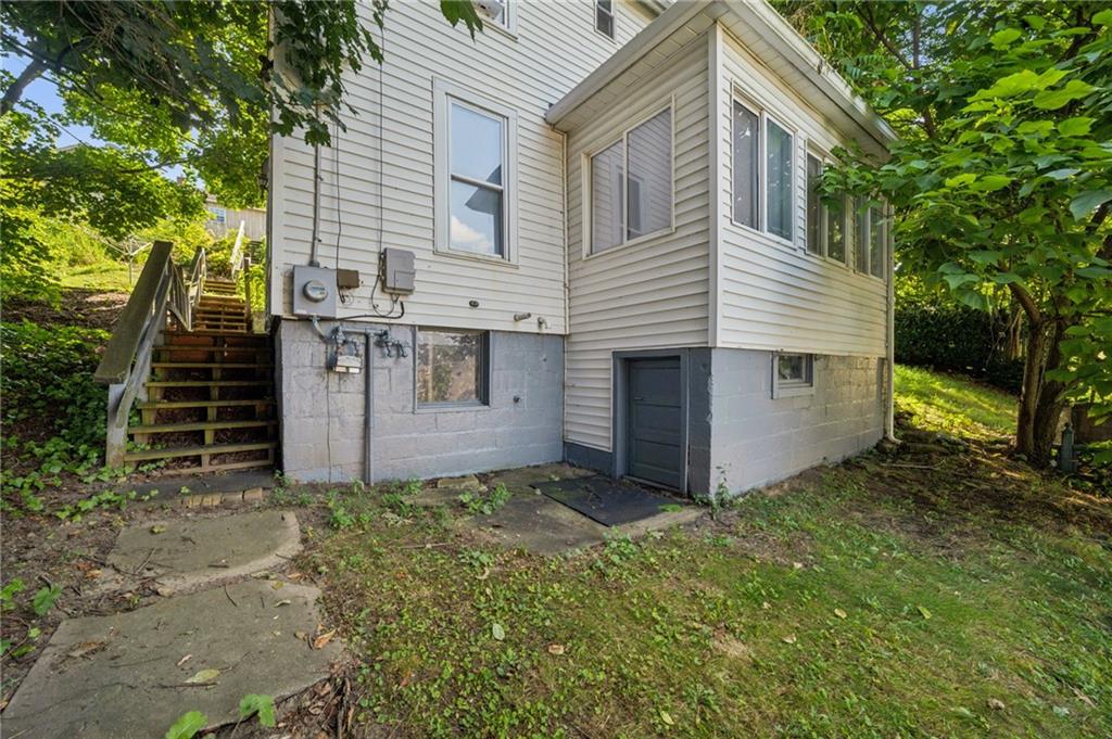 311 Lowell Street Vandergrift, PA 15690 - Photo 24 of 25 a view of a house with a yard