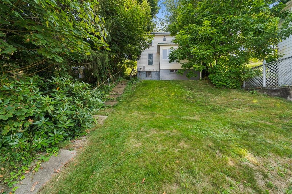 311 Lowell Street Vandergrift, PA 15690 - Photo 25 of 25 a view of a house with a yard
