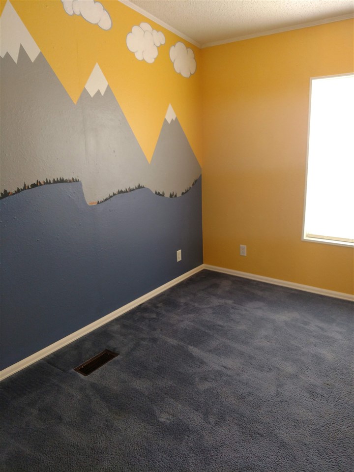 19776 Ward Creek Road Cedaredge, CO 81413 - Photo 12 of 25 an empty room with windows