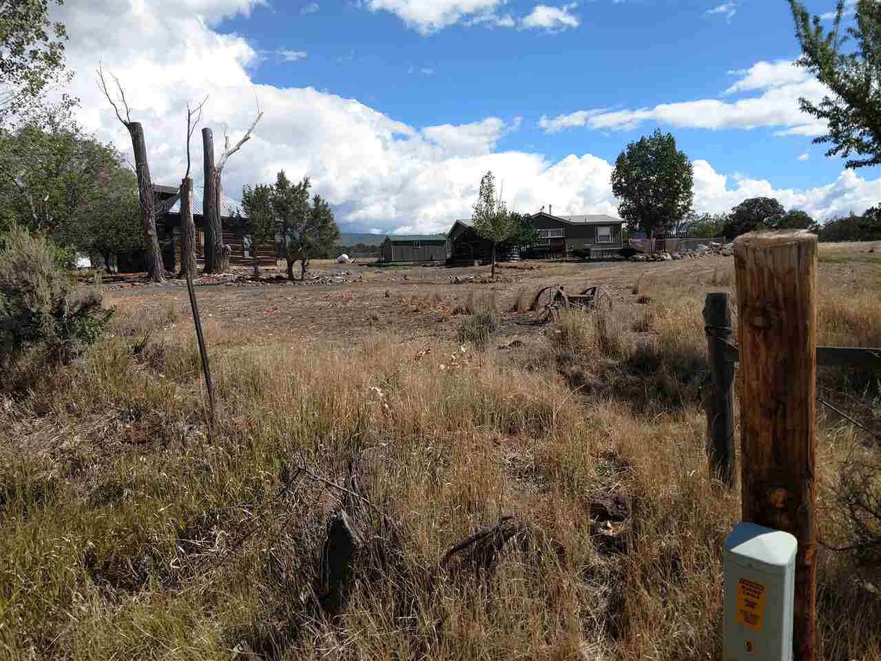19776 Ward Creek Road Cedaredge, CO 81413 - Photo 24 of 25 a view of a yard with wooden fence