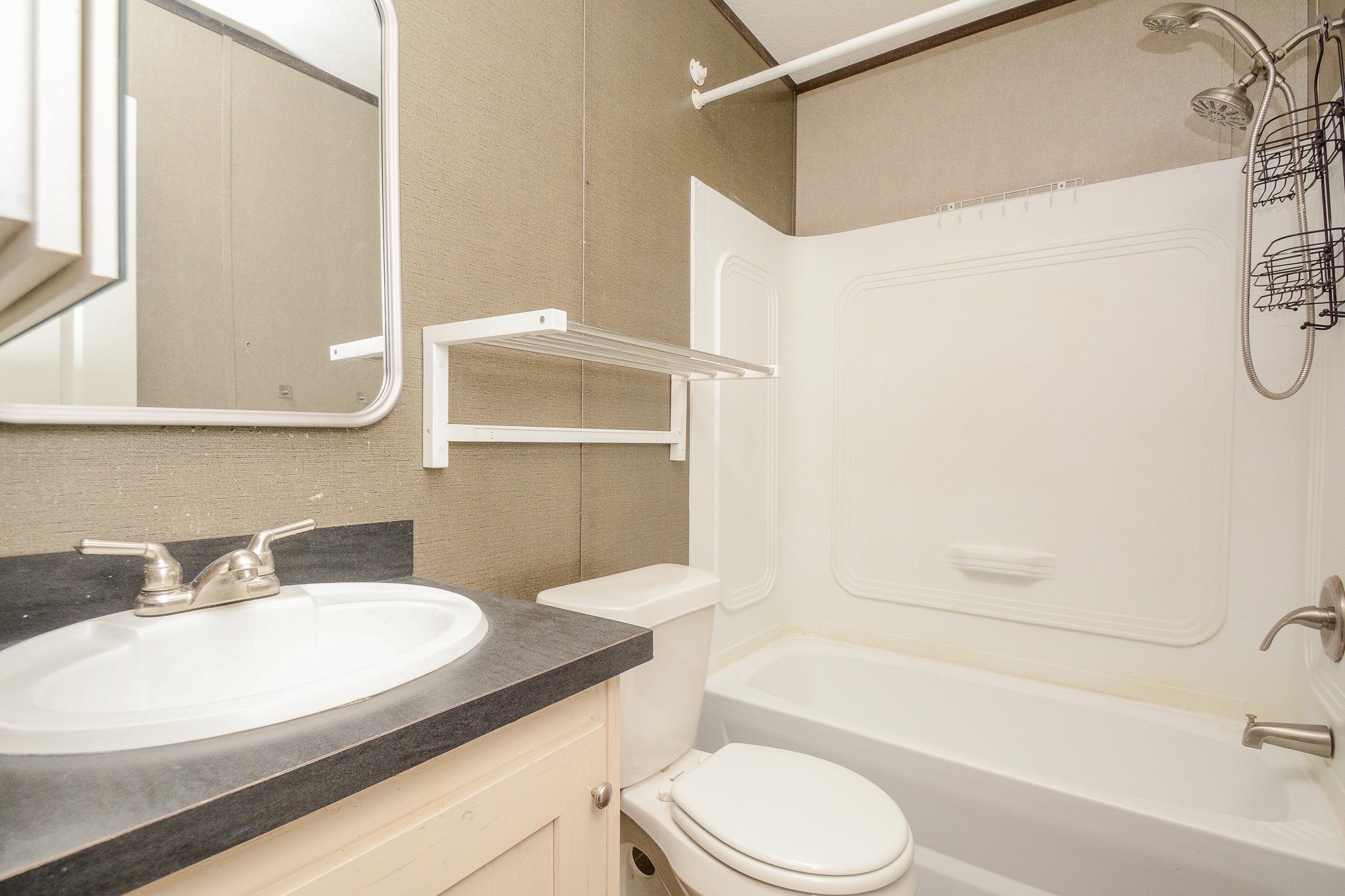 3610 Alice Street Fresno, TX 77545 - Photo 19 of 26 a bathroom with a granite countertop sink toilet and shower