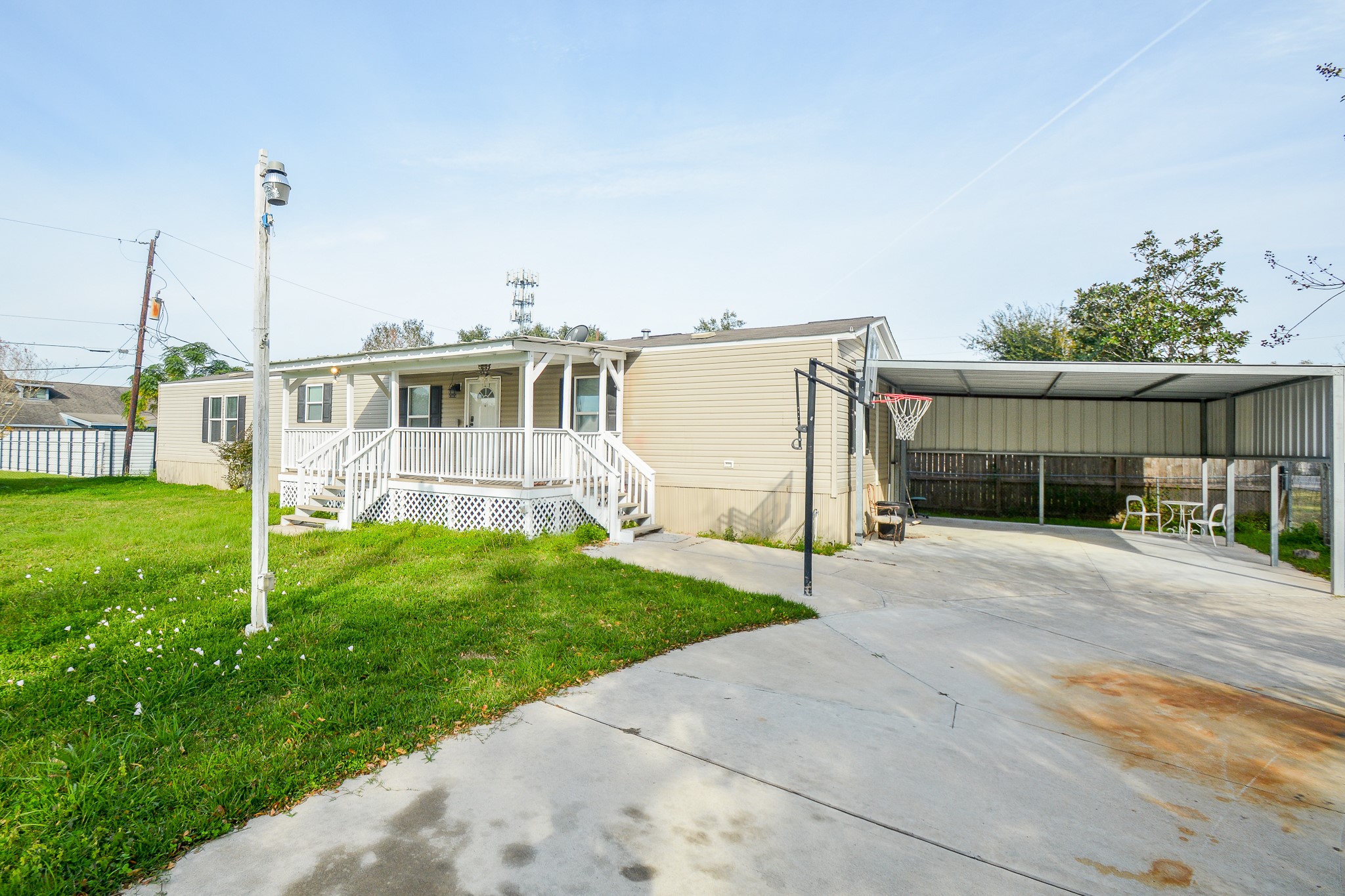 3610 Alice Street Fresno, TX 77545 - Photo 21 of 26 a view of a house with a backyard and a patio
