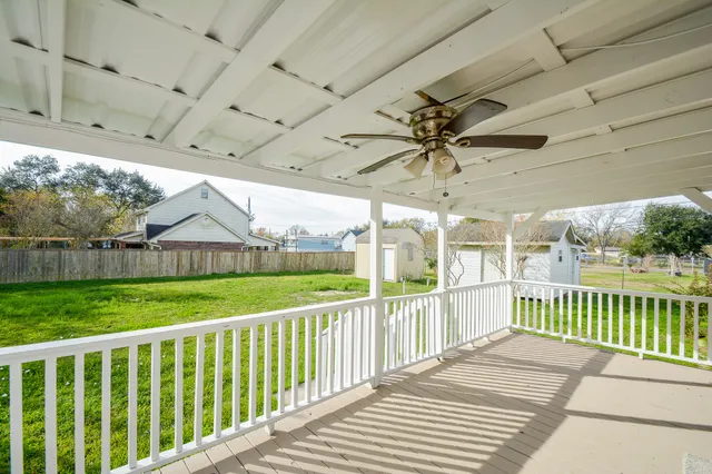a view of a porch and garden