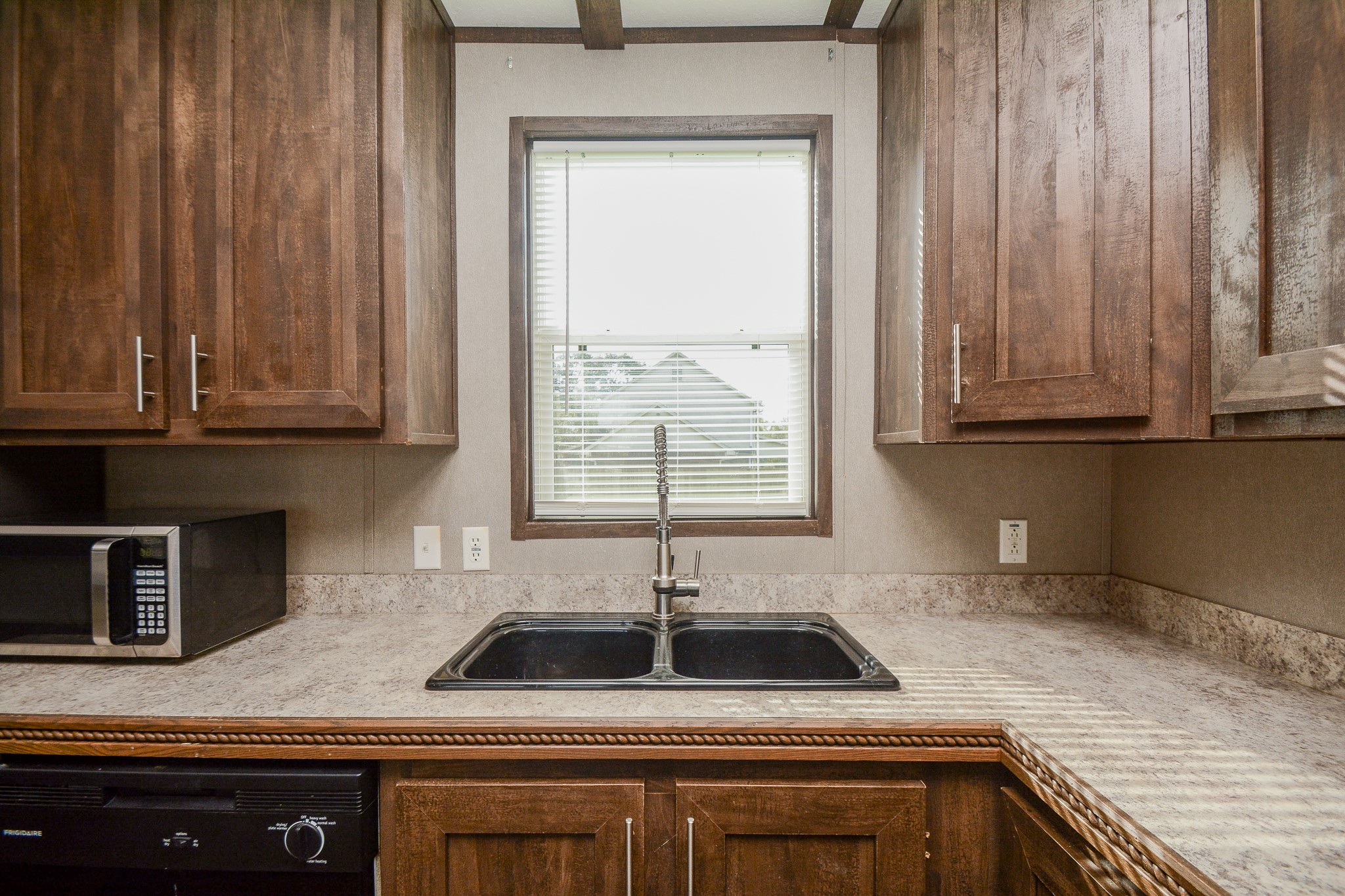 3610 Alice Street Fresno, TX 77545 - Photo 10 of 26 a kitchen with stainless steel appliances granite countertop white cabinets and a sink