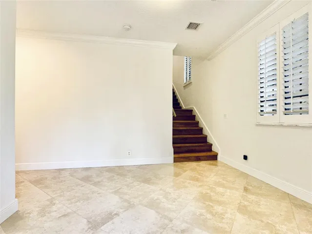 a view of entryway with stairs