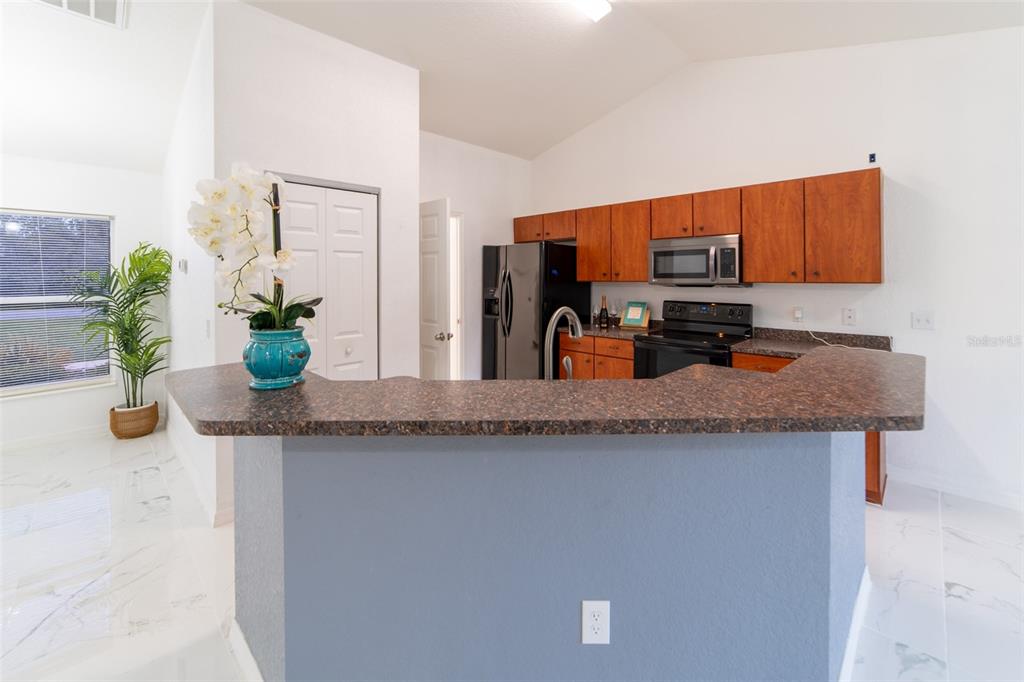 5107 Southwest 165th St Road Ocala, FL 34473 - Photo 11 of 34 a kitchen with sink and cabinets