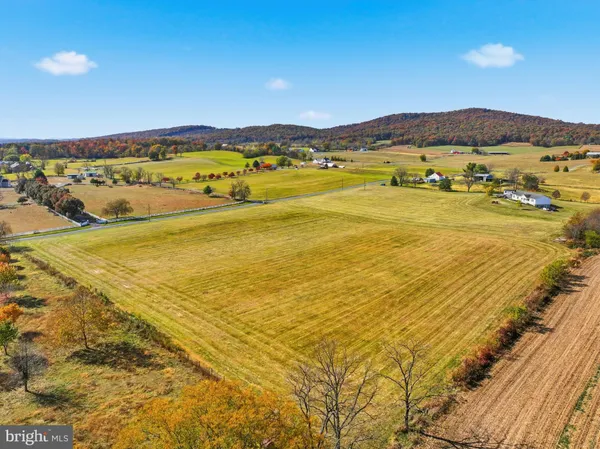 a view of an ocean and a mountain