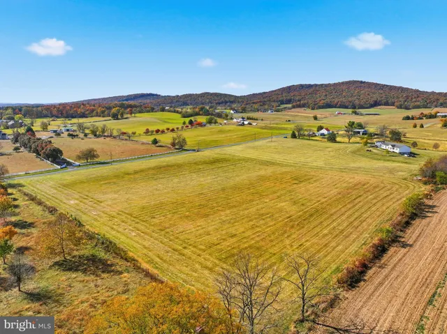 a view of an ocean and a mountain