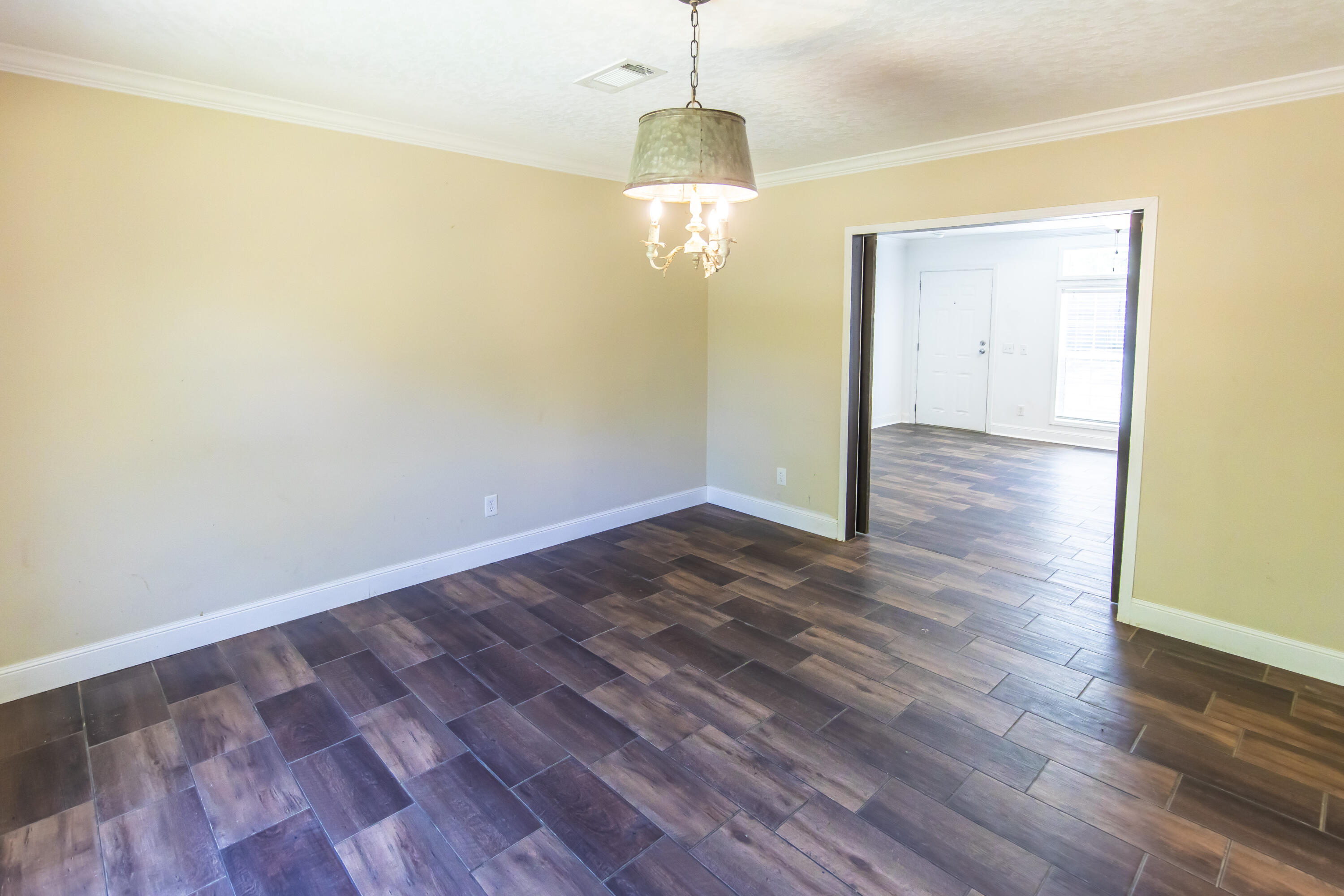 748 Phillips Drive Freeport, FL 32439 - Photo 13 of 50 wooden floor in an empty room