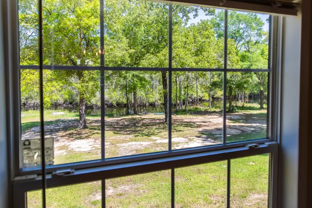a view of large green space with a ocean view