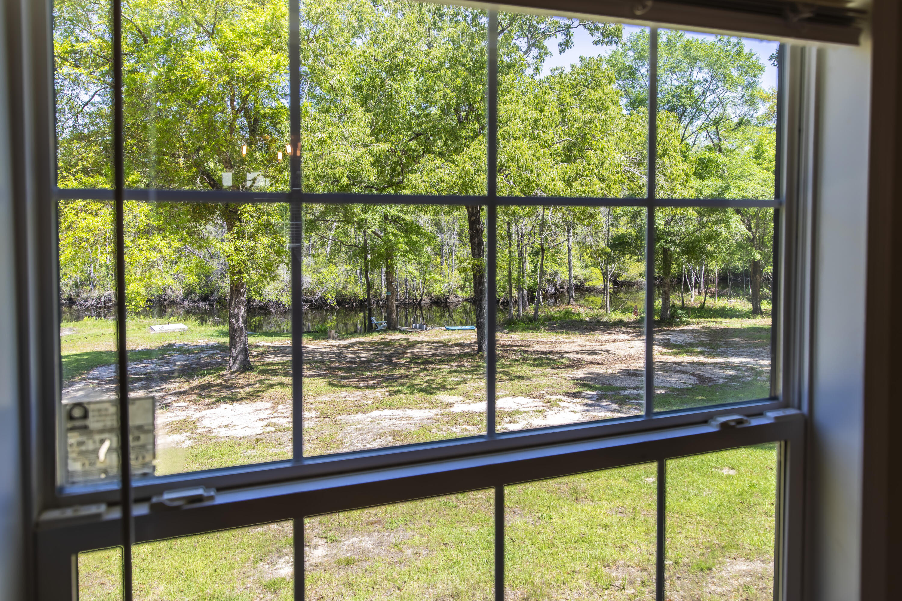 748 Phillips Drive Freeport, FL 32439 - Photo 14 of 50 a view of large green space with a ocean view