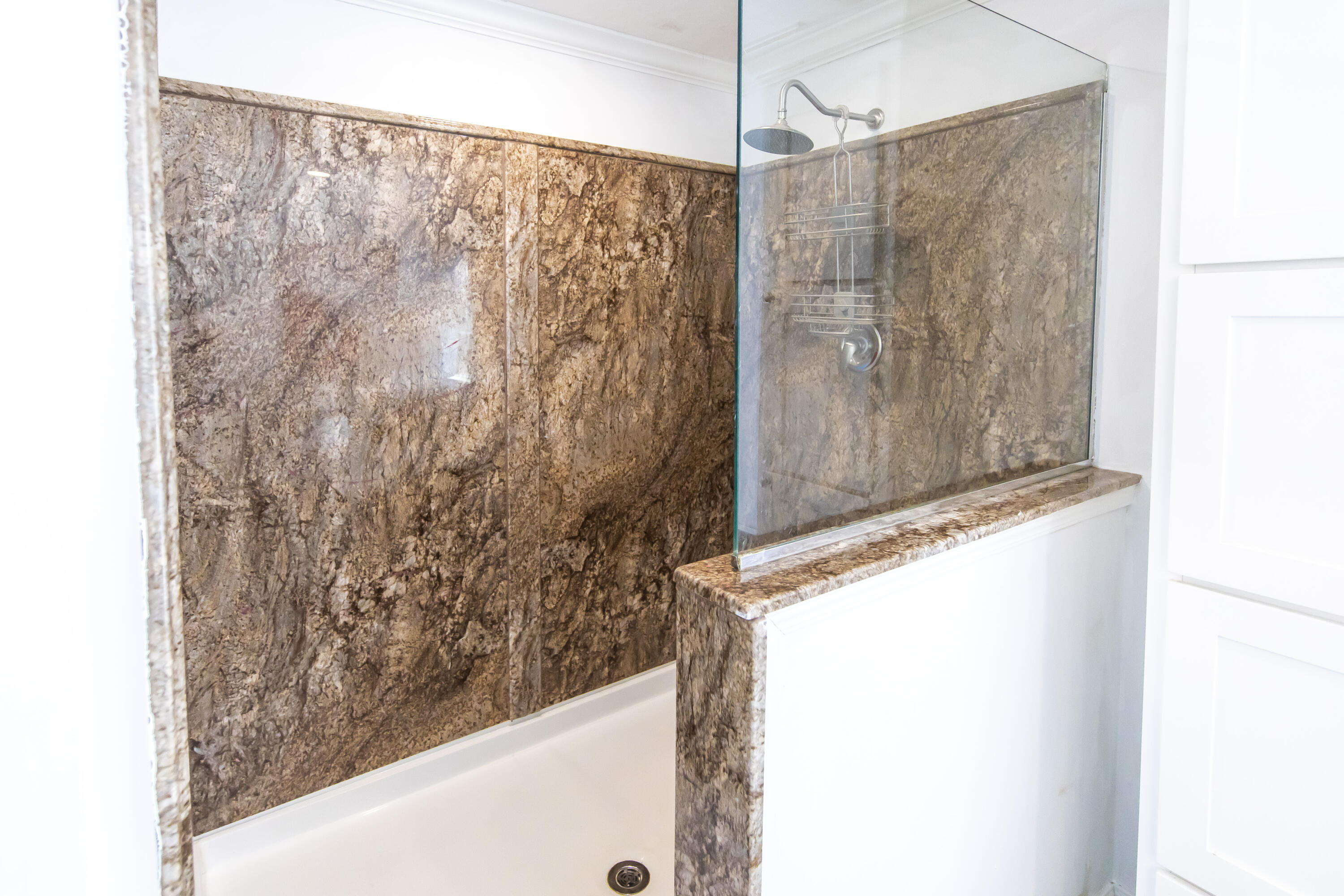 748 Phillips Drive Freeport, FL 32439 - Photo 28 of 50 a bathroom with a bathtub and shower