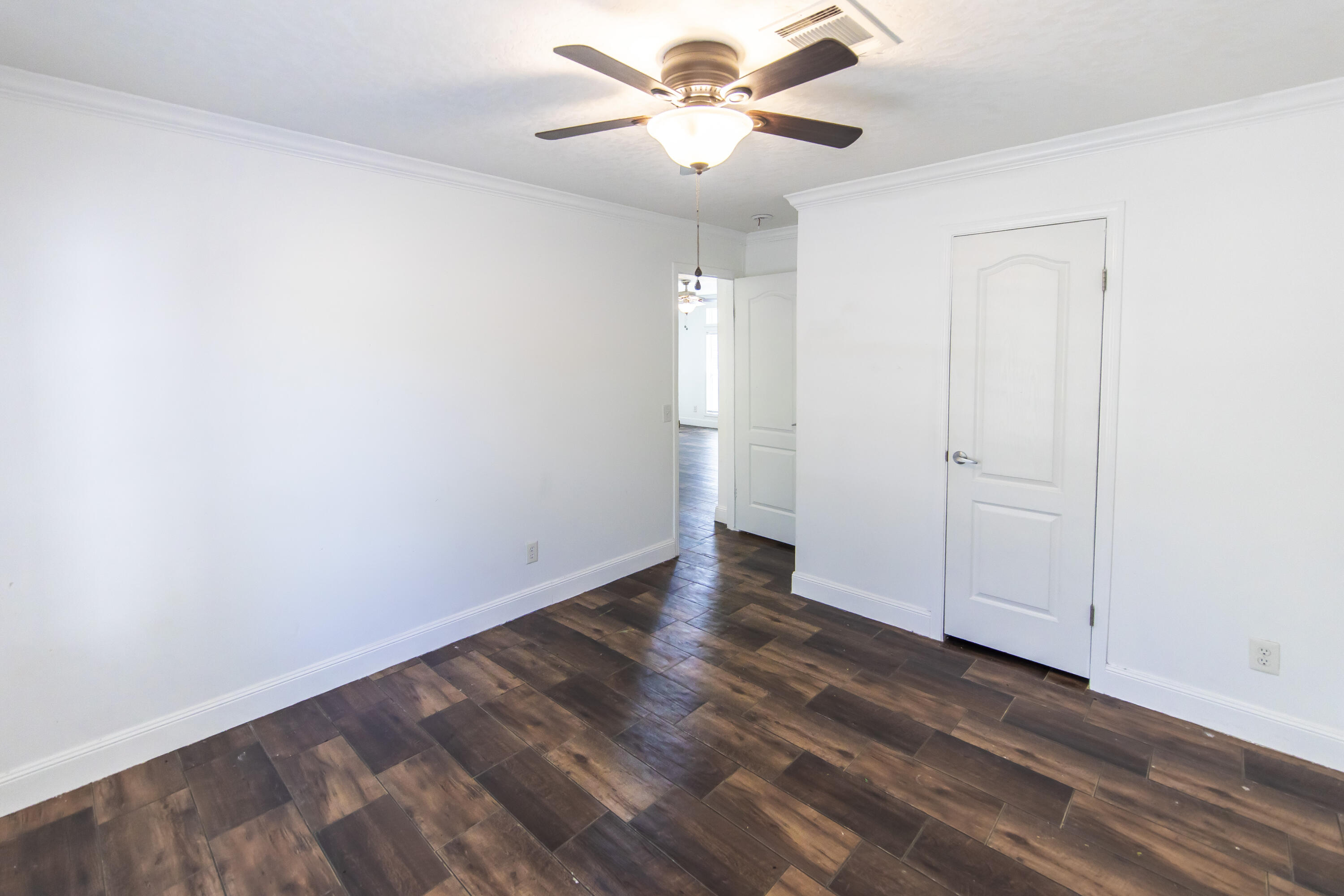 748 Phillips Drive Freeport, FL 32439 - Photo 30 of 50 wooden floor in an empty room