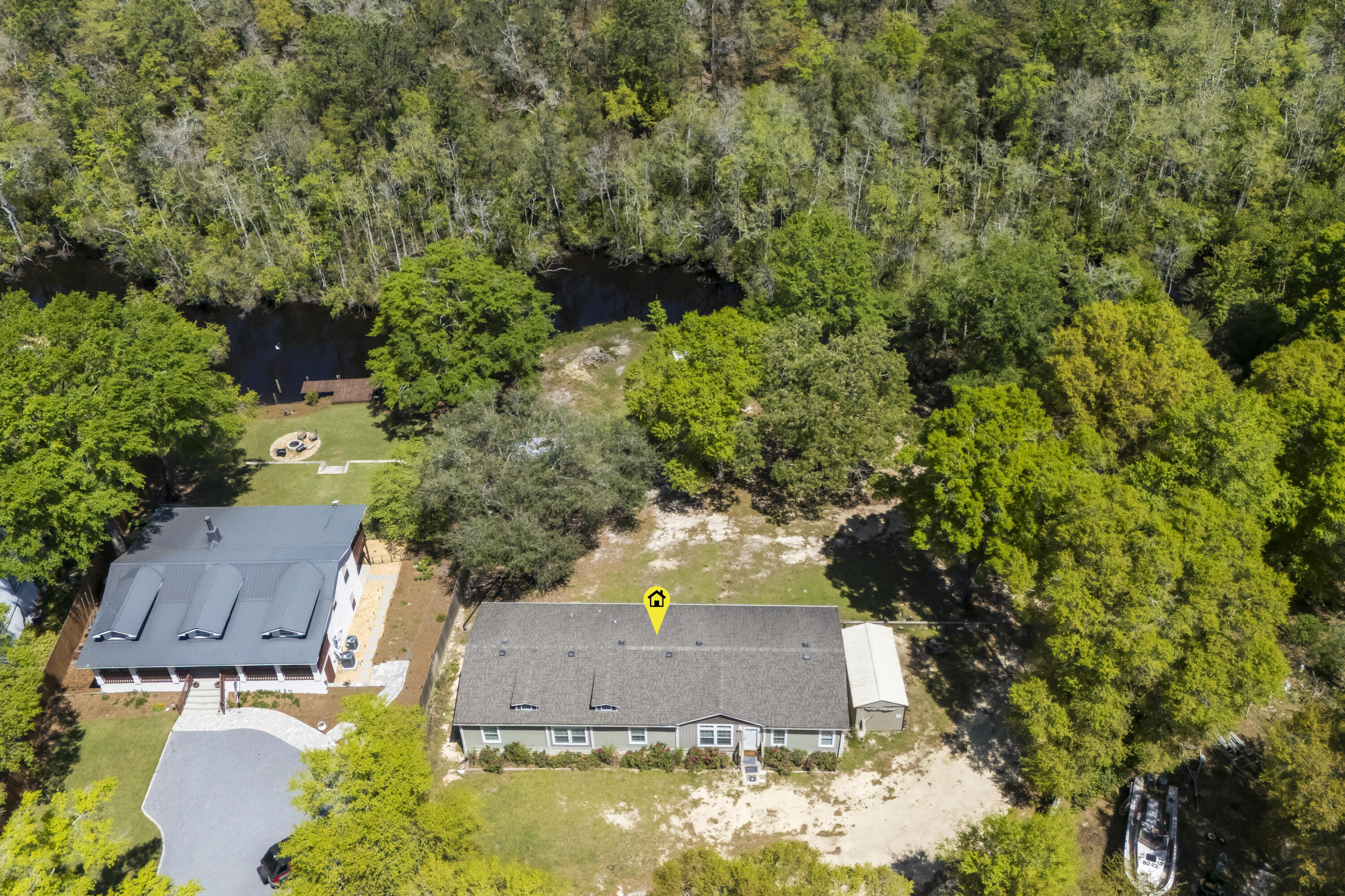 748 Phillips Drive Freeport, FL 32439 - Photo 5 of 50 an aerial view of a house with yard swimming pool and outdoor seating