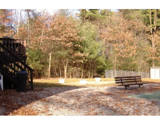 15 Livingston Road Pelham, NH 03076 - Photo 6 of 6 a view of outdoor space with trees