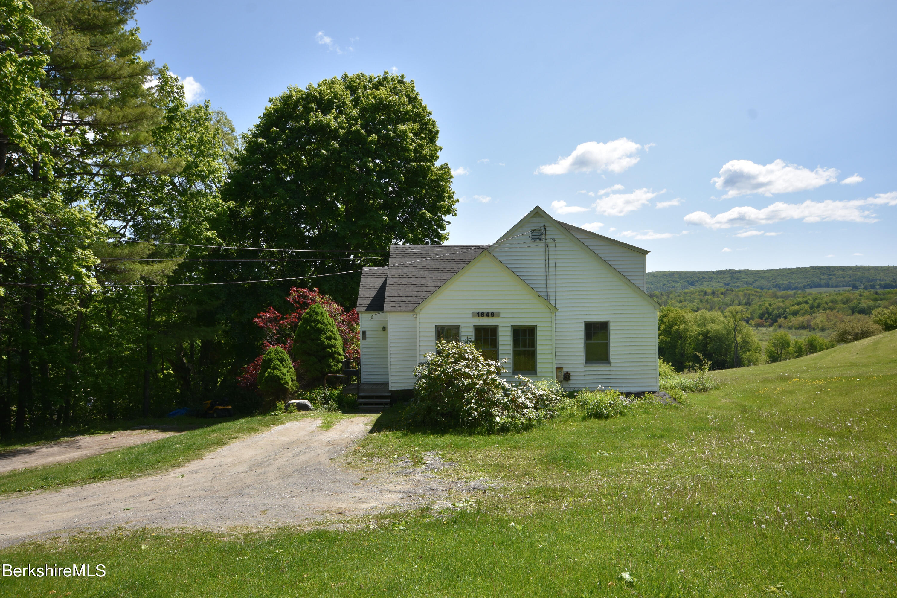 1649 State Road Richmond, MA 01254 - Photo 1 of 43 a view of backyard of house with green space