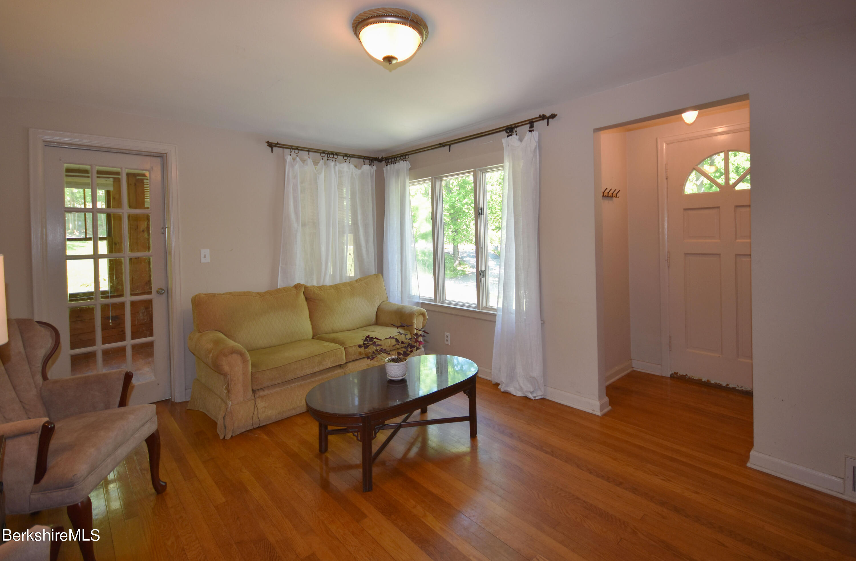 1649 State Road Richmond, MA 01254 - Photo 6 of 43 a living room with furniture and a window