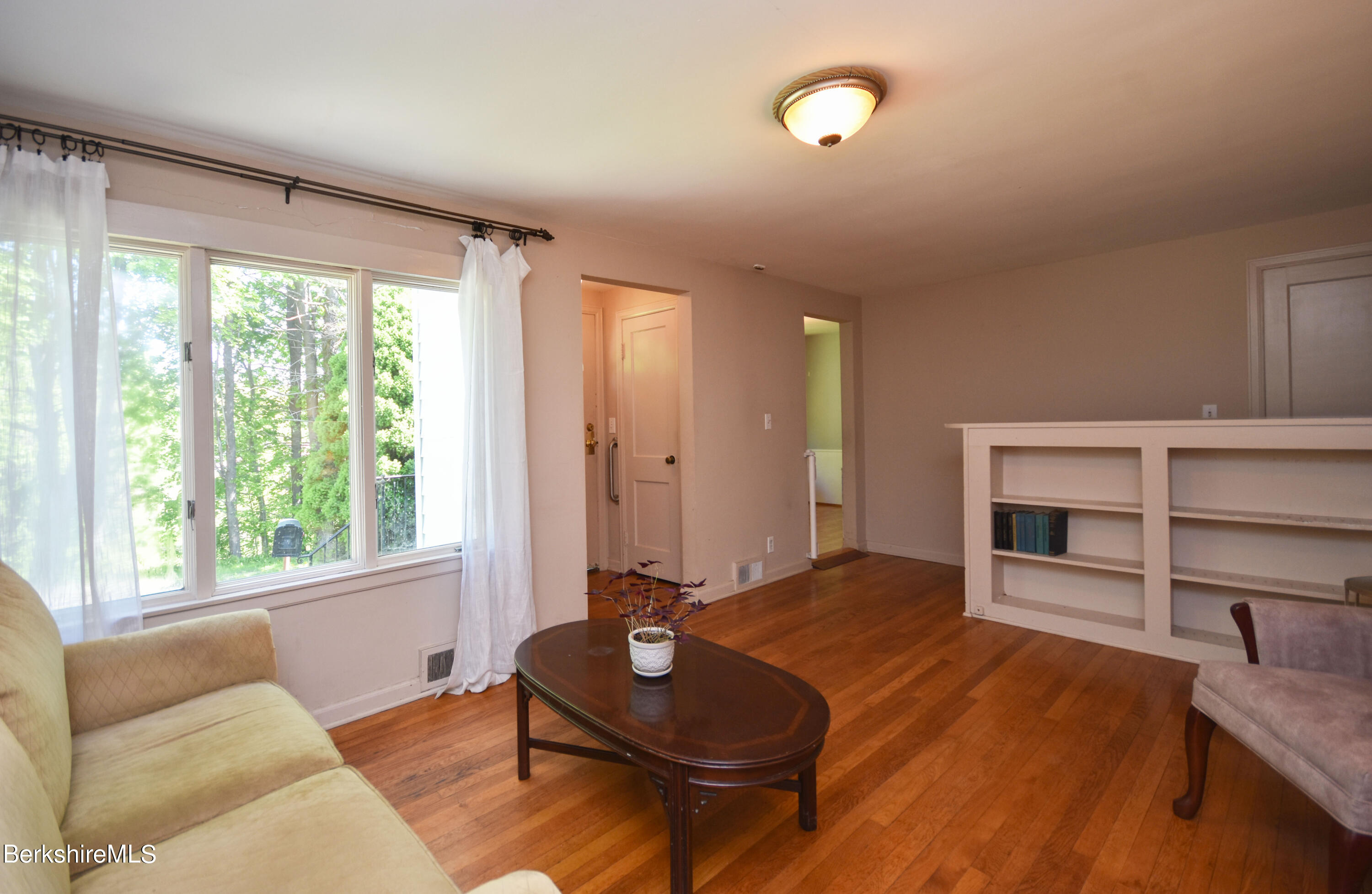 1649 State Road Richmond, MA 01254 - Photo 8 of 43 a living room with furniture a window and wooden floor
