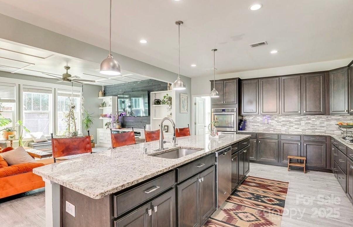 411 Stonefield Circle Moncks Corner, SC 29461 - Photo 12 of 42 a kitchen with lots of counter space