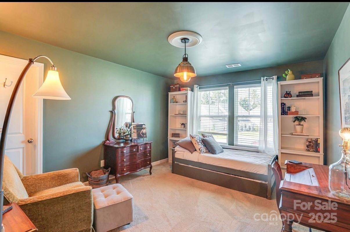 411 Stonefield Circle Moncks Corner, SC 29461 - Photo 31 of 42 a bedroom with furniture and a large window