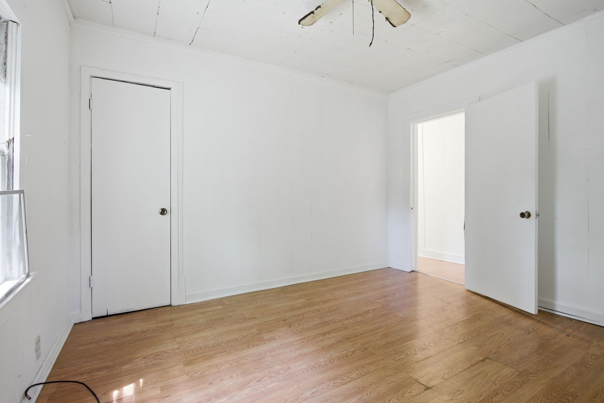433 Jones Street Pulaski, TN 38478 - Photo 16 of 25 a view of empty room with wooden floor
