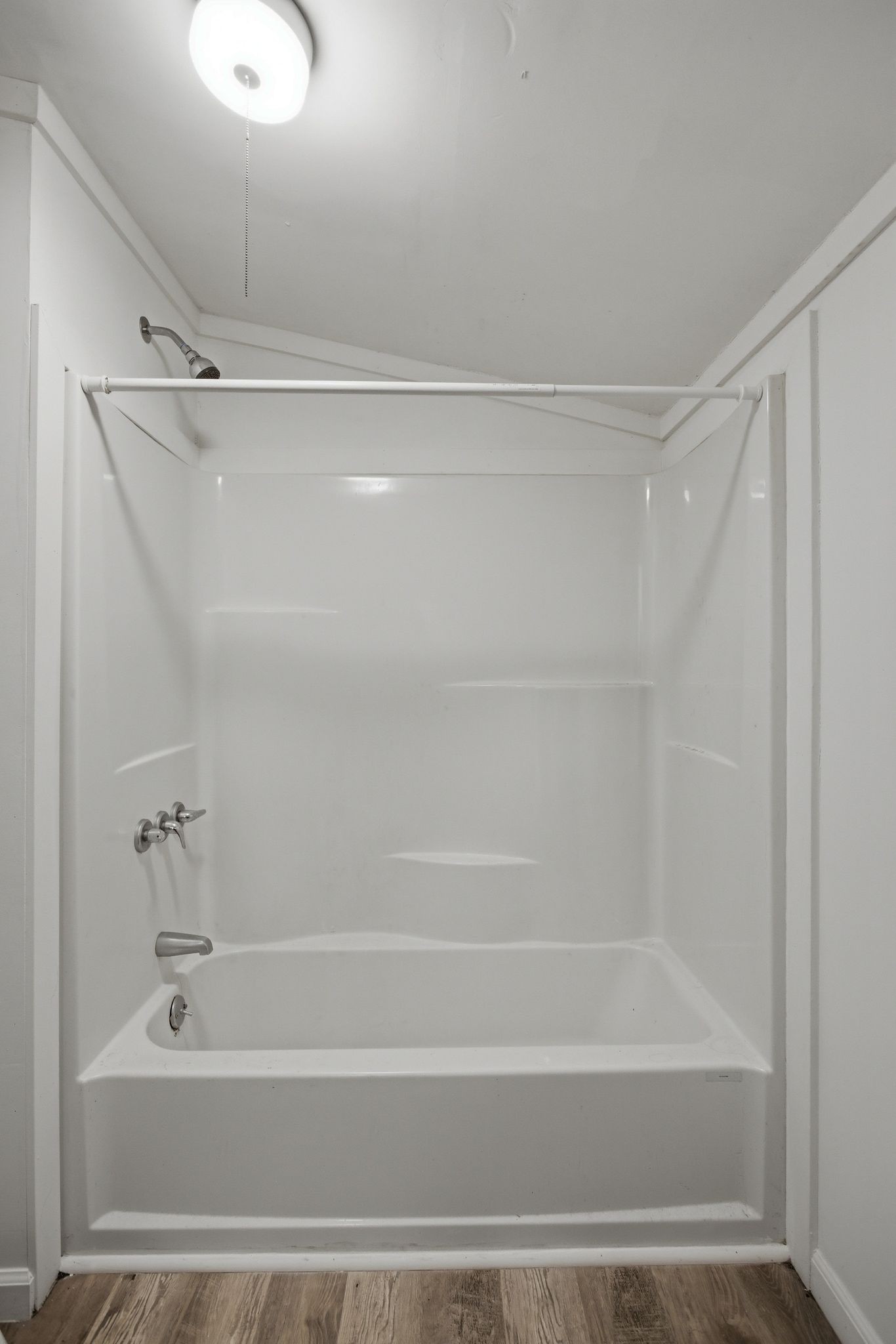 433 Jones Street Pulaski, TN 38478 - Photo 23 of 25 a bathroom with a shower and a bath tub
