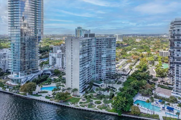 a view of a lake with a multi story building