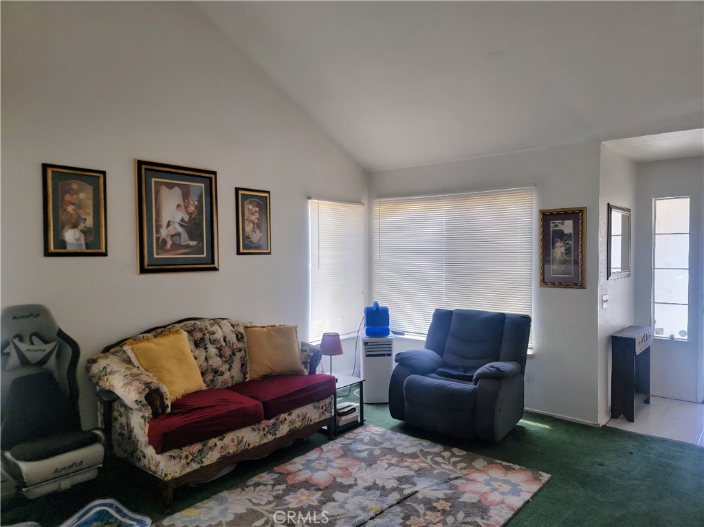 a living room with furniture and a couch