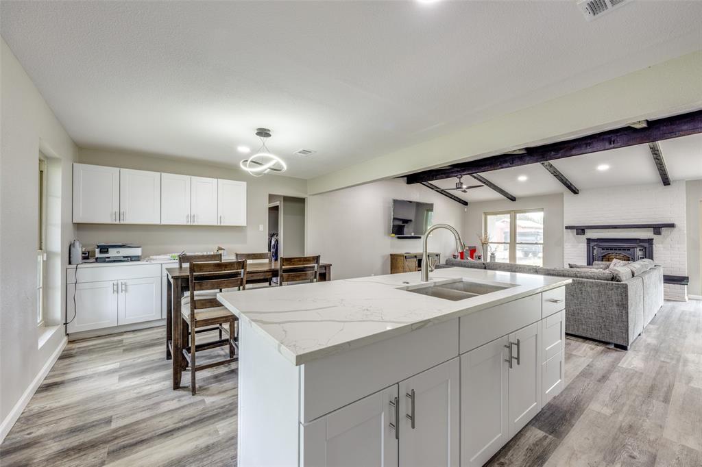 738 Campground Road Sherman, TX 75090 - Photo 40 of 40 a kitchen with a sink stove and cabinets