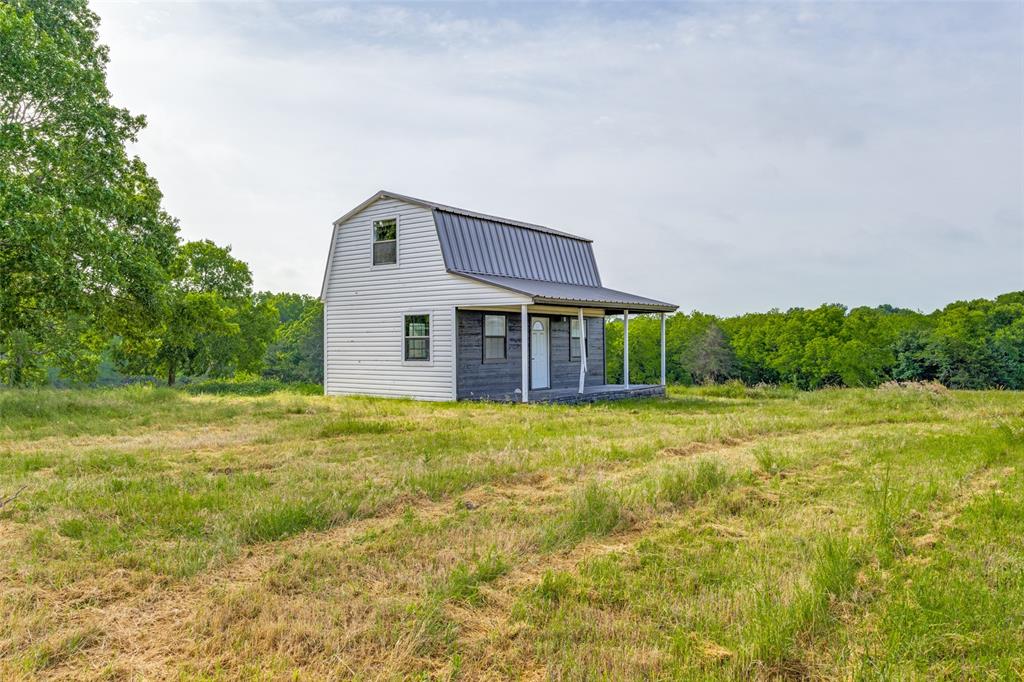738 Campground Road Sherman, TX 75090 - Photo 34 of 40 a front view of a house with a yard