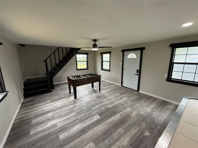 a view of empty room with windows