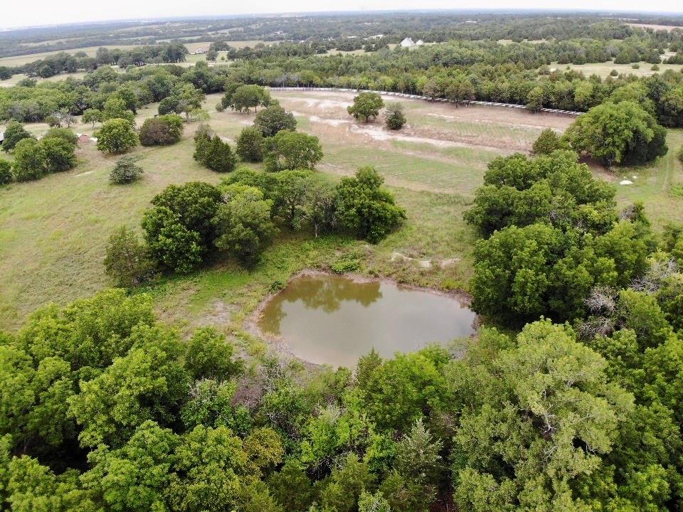 738 Campground Road Sherman, TX 75090 - Photo 4 of 40 an aerial view of residential houses with outdoor space and trees