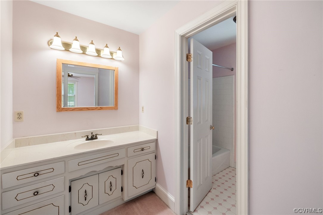 11100 Golden Leaf Road Chester, VA 23831 - Photo 12 of 39 a bathroom with a double vanity sink mirror and