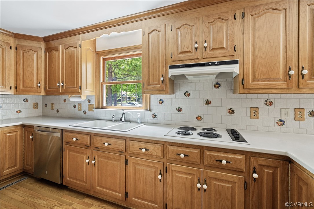 11100 Golden Leaf Road Chester, VA 23831 - Photo 15 of 39 a kitchen with stainless steel appliances granite countertop a sink a stove and cabinets