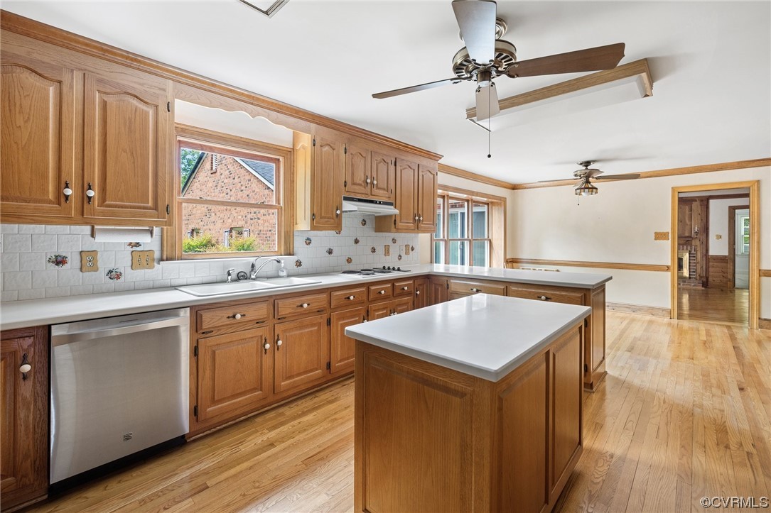 11100 Golden Leaf Road Chester, VA 23831 - Photo 18 of 39 a kitchen with a sink stove and wooden cabinets