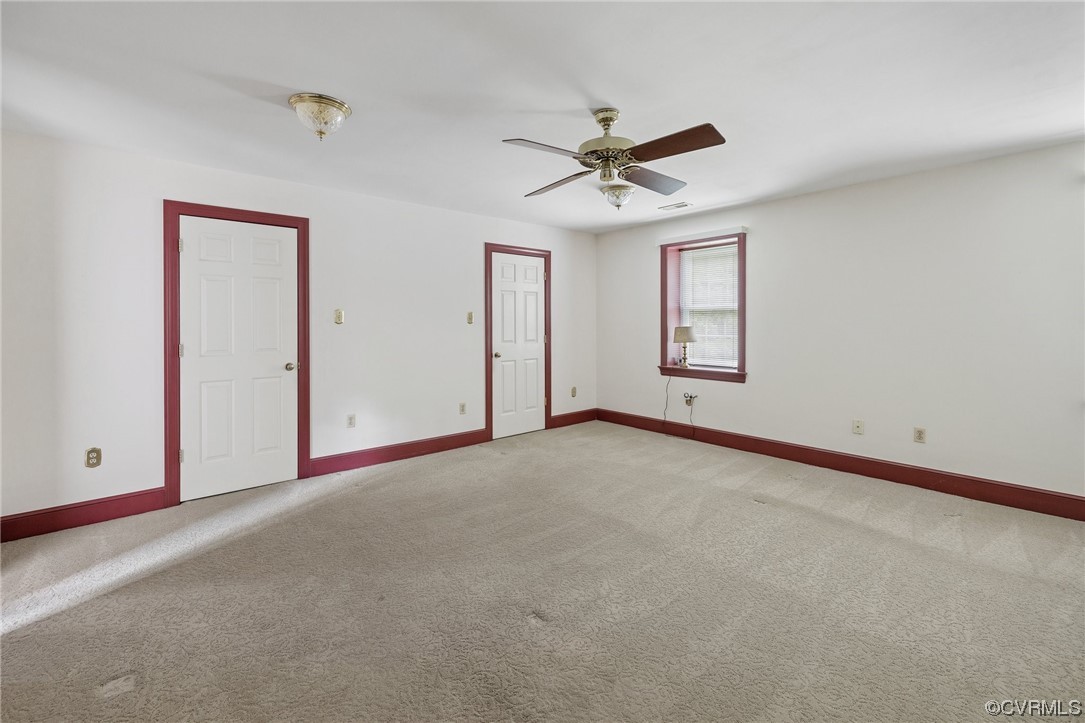 11100 Golden Leaf Road Chester, VA 23831 - Photo 20 of 39 a view of a livingroom with a ceiling fan and window