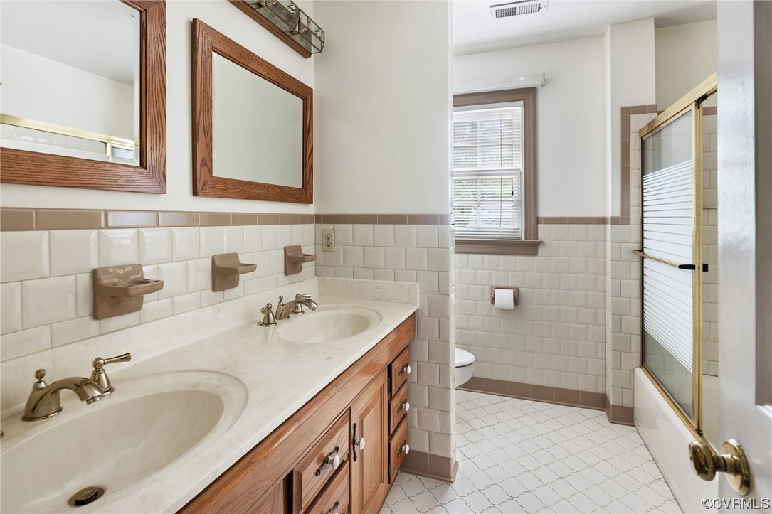 11100 Golden Leaf Road Chester, VA 23831 - Photo 24 of 39 a bathroom with a sink and a mirror