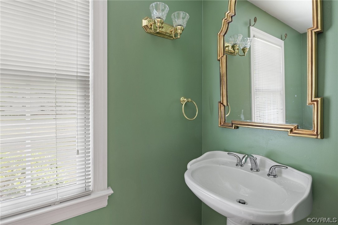 11100 Golden Leaf Road Chester, VA 23831 - Photo 27 of 39 a bathroom with a sink and a mirror