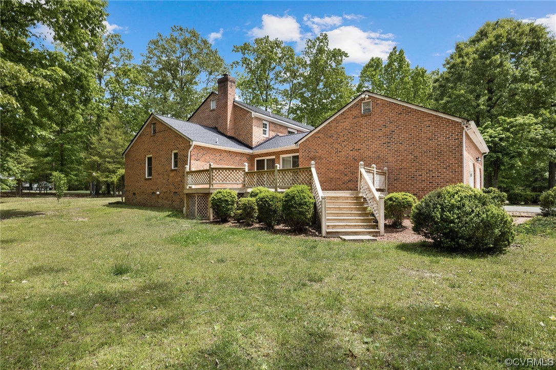 11100 Golden Leaf Road Chester, VA 23831 - Photo 31 of 39 a view of a house with a yard and plants