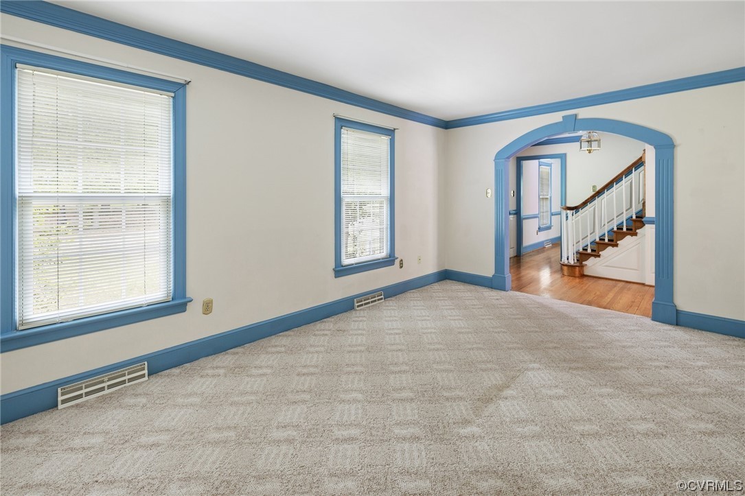 11100 Golden Leaf Road Chester, VA 23831 - Photo 6 of 39 a view of an empty room with window and stairs
