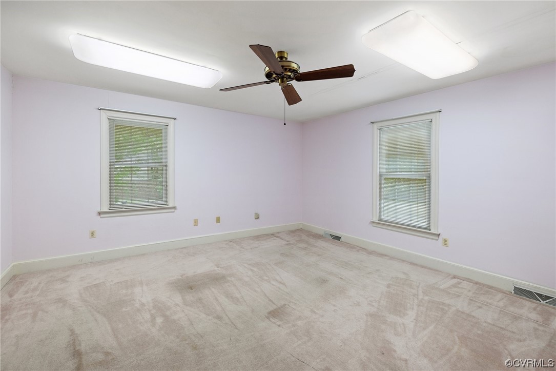 11100 Golden Leaf Road Chester, VA 23831 - Photo 10 of 39 an empty room with a window