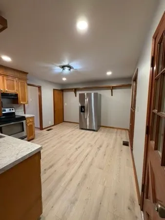 a view of a kitchen with a sink